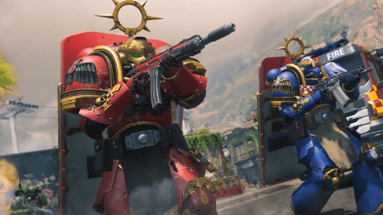 Warhammer 40K characters in red and blue armor running past a fire truck while holding a gun.