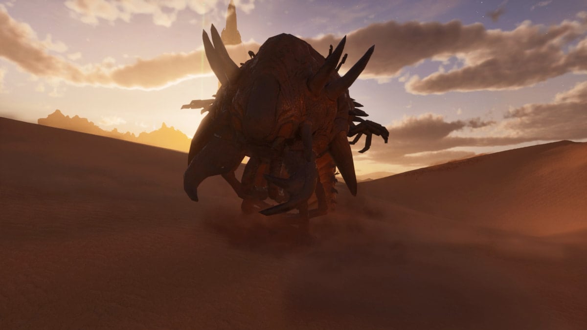 A Deathworm attacking in Ark: Survival Ascended Scorched Earth.