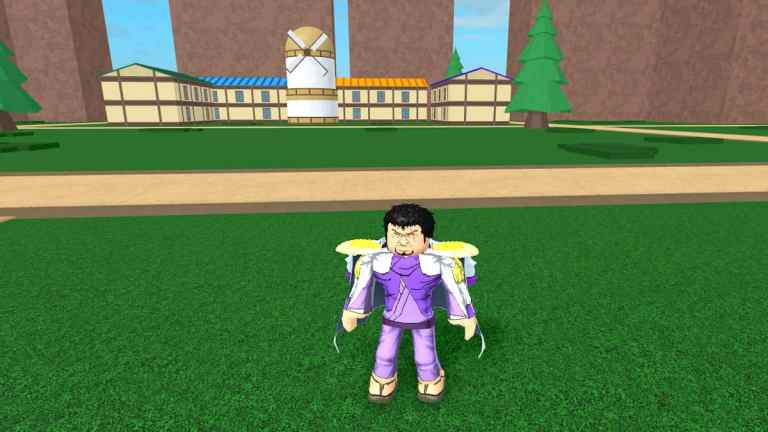 A character stands in a grass lawn outside a house in Blox Fruits.