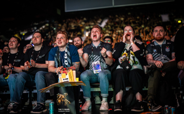 OG fans cheer on their team at the Dota 2 ESL One Birmingham tournament