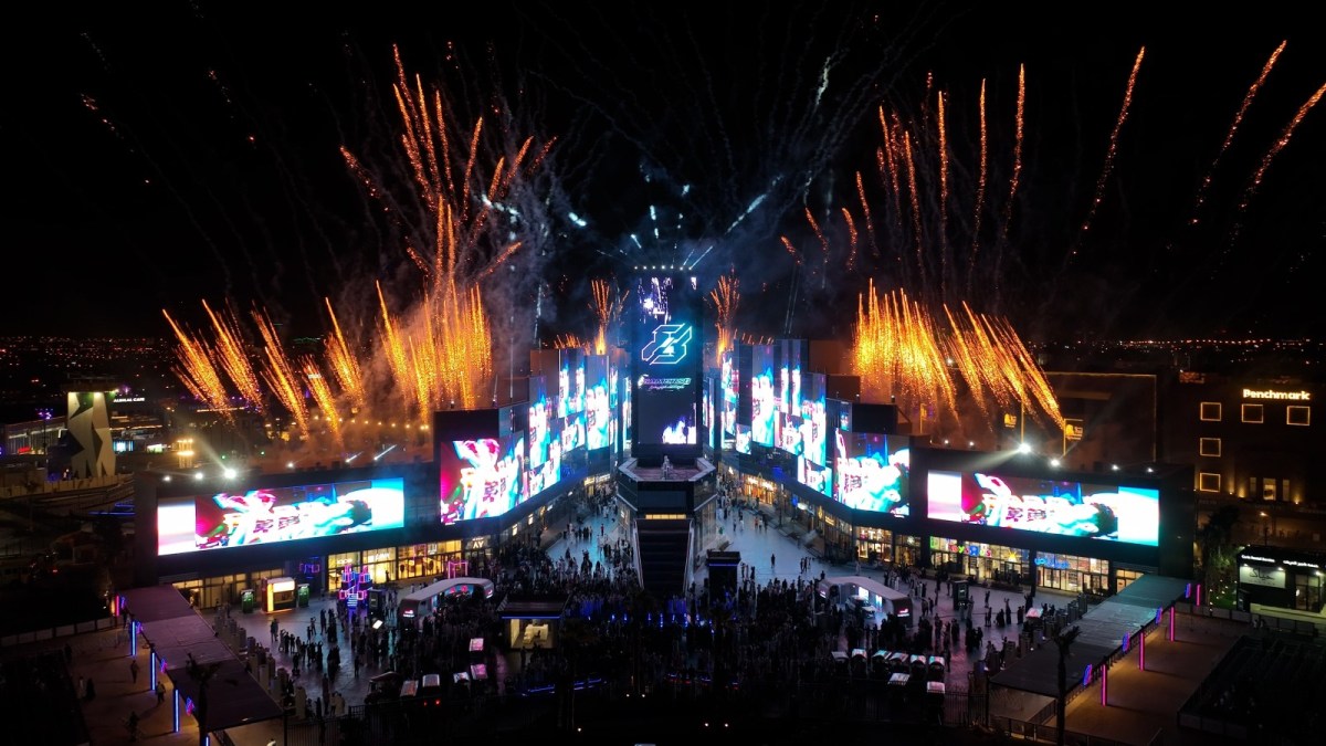 A giant stage with fireworks going off in the background.