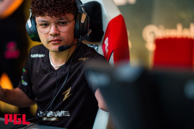 Salazar, a player for ECSTATIC, checks a monitor at the PGL CS2 Copenhagen Major.