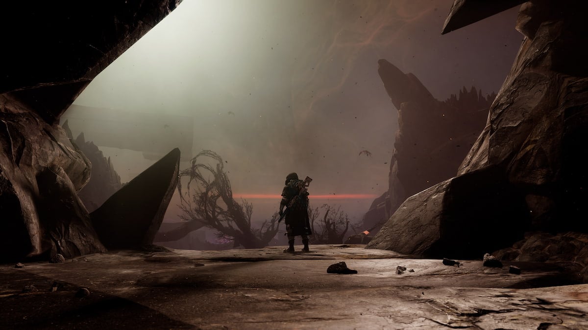 A Hunter stands alone in a dark area in The Final Shape in Destiny 2