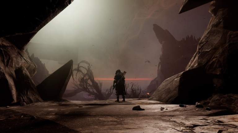 A Hunter stands alone in a dark area in The Final Shape in Destiny 2