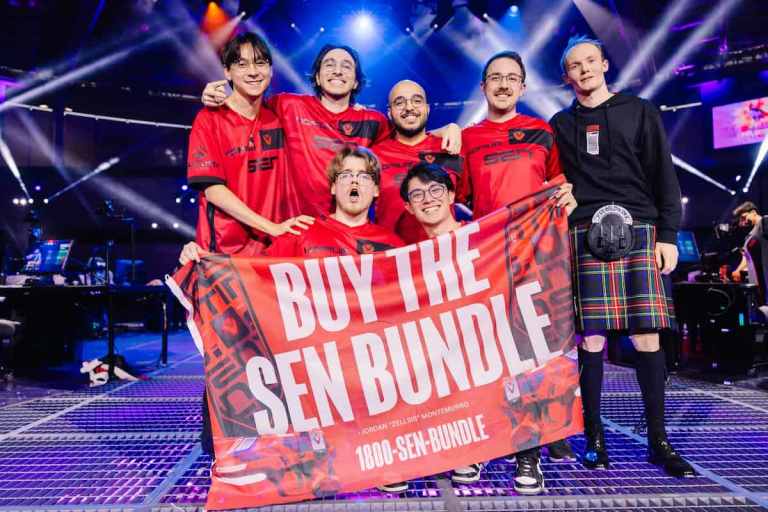 Sentinels VALORANT team on stage holding a "Buy the Sen bundle" flag.