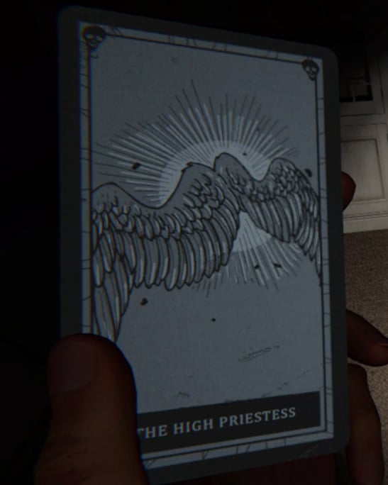 The High Priestess card in Phasmophobia. 