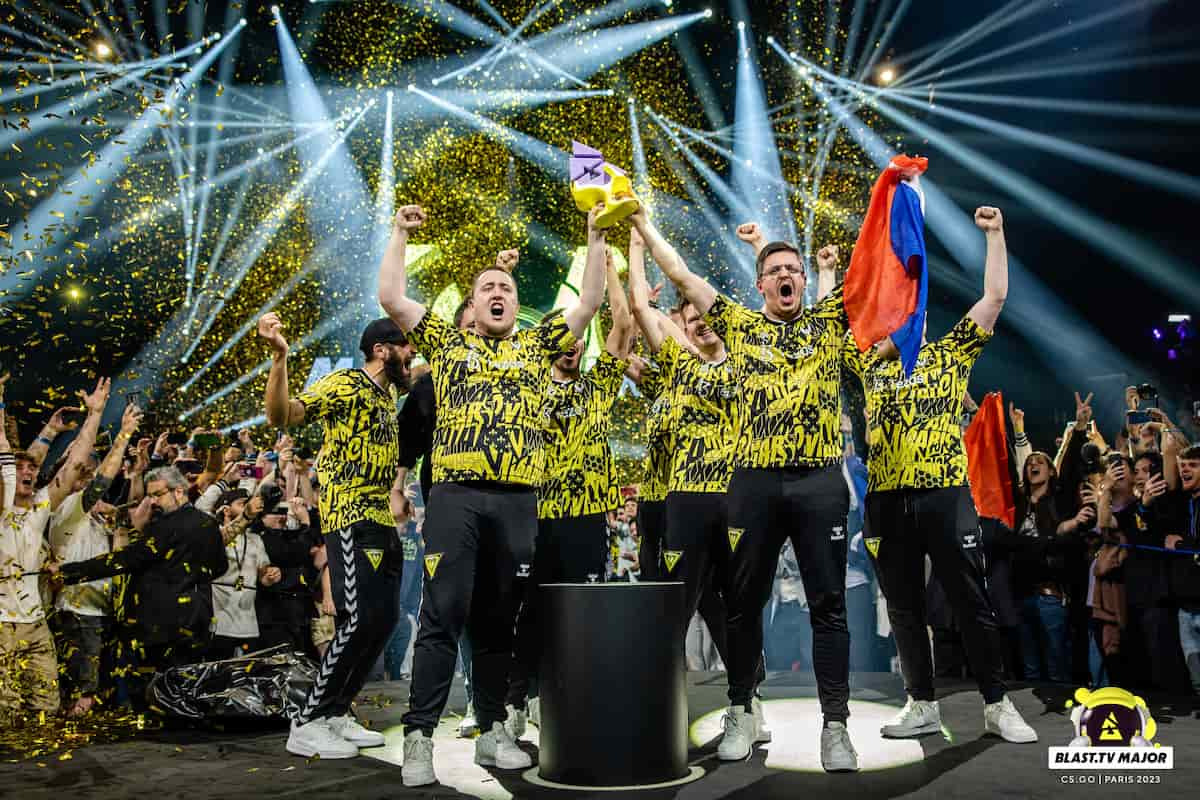 Team Vitality celebrates with the BLAST.tv Paris Major trophy.