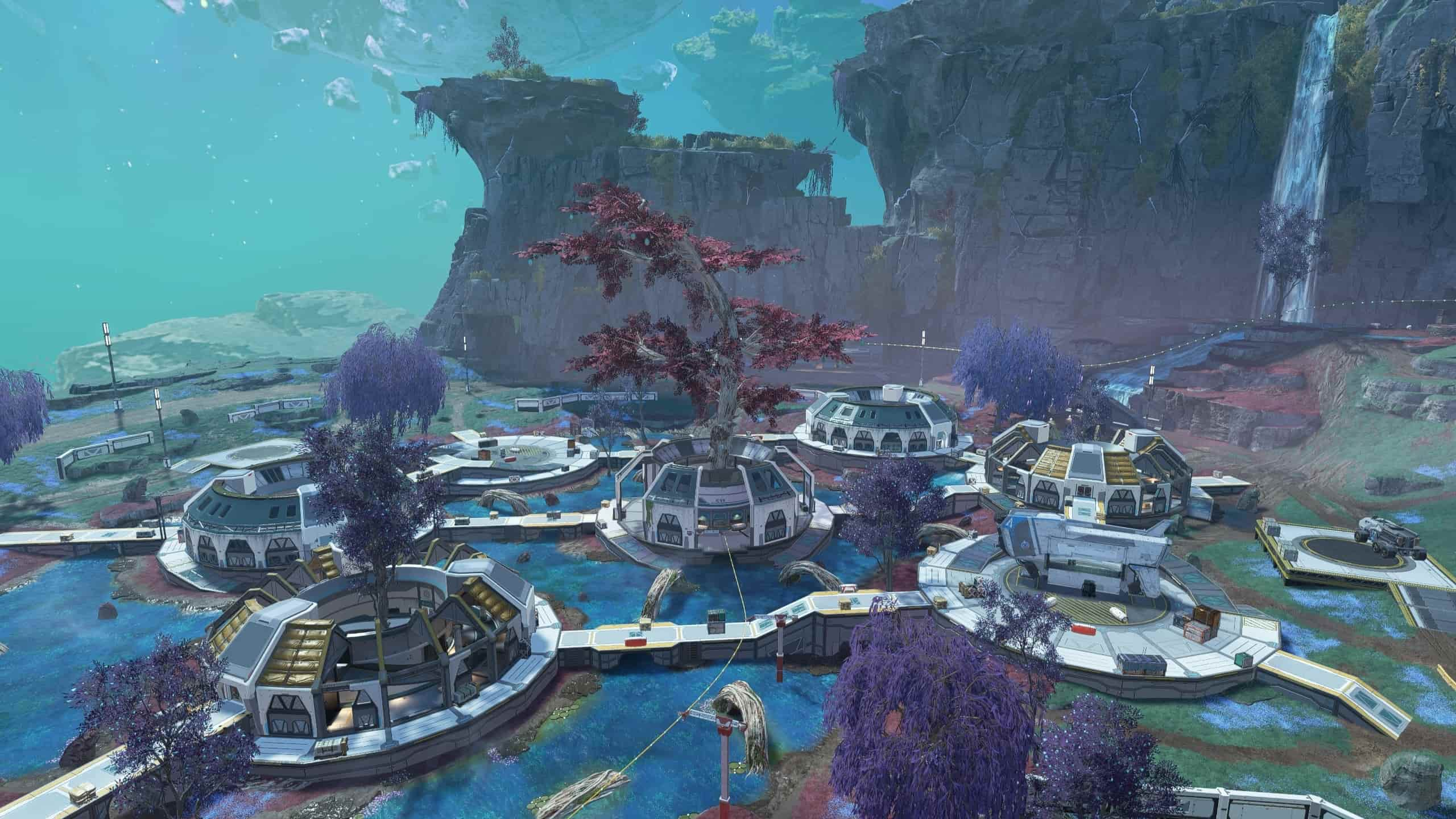 Several circular structures with alien trees growing out of them in Apex.