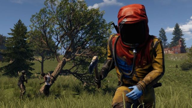 Rust player wearing a hazmat suit and charging forward with an Axe in right hand