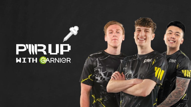 Three players standing next to the Garnier logo.