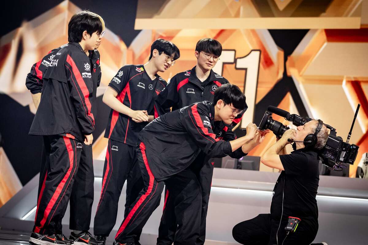 T1 celebrating victory at the Esports World Cup.