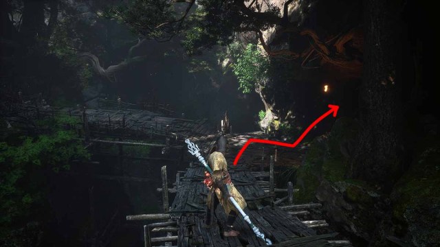 Red arrow pointing to Shen Monkey's Cave in Black Myth: Wukong