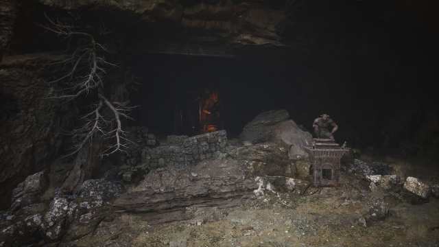 An altar is hidden inside the rock and has a Buddha statue at its feet. The entrance is behind a statue of a man-tiger kneeling.