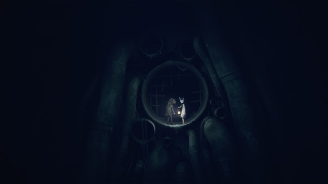 Two characters in REANIMAL hiding in a dark sewer tunnel