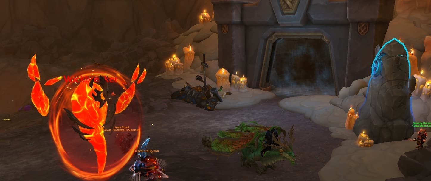 Characters fight a fire elemental outside of the Lost Mines in WoW The War Within