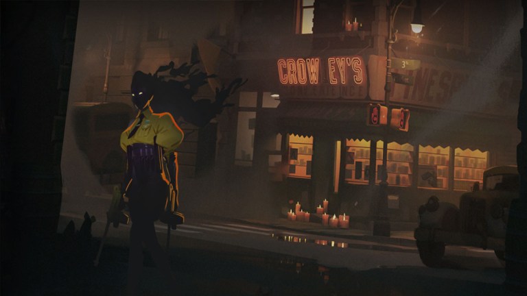 A shadowy woman walks in front of the lit-up windows of a city shop.