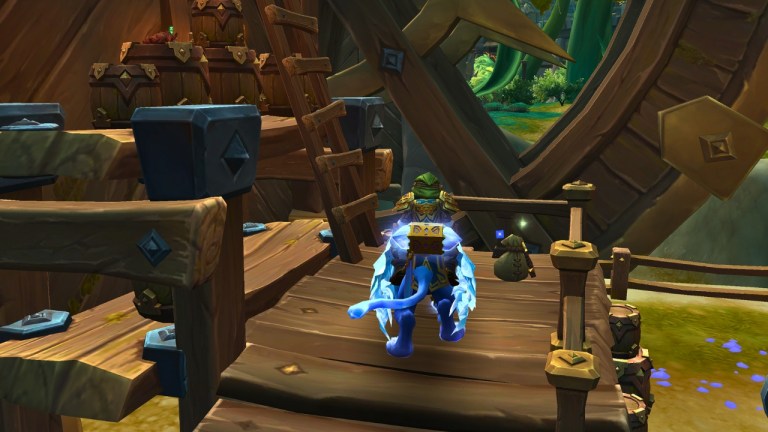 player standing in front of a water wheel and a sparkling bag in wow the war within