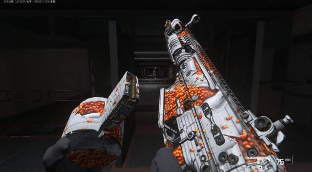 Spilled Beans camo on a gun being reloaded in MW3