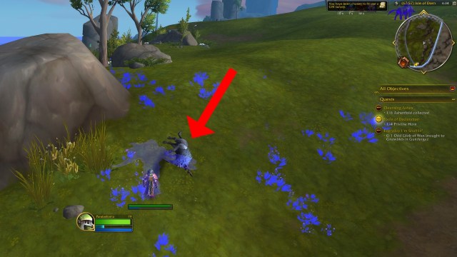 A red arrow pointing to a slain impaler in wow the war within