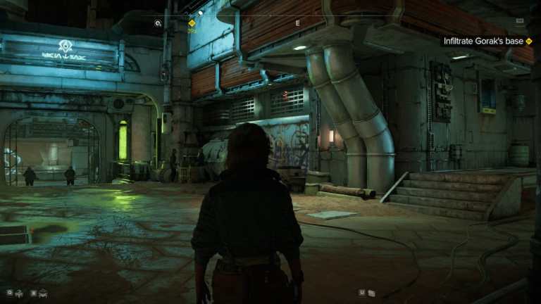 Kay standing in front of a Pyke district in Star Wars Outlaws