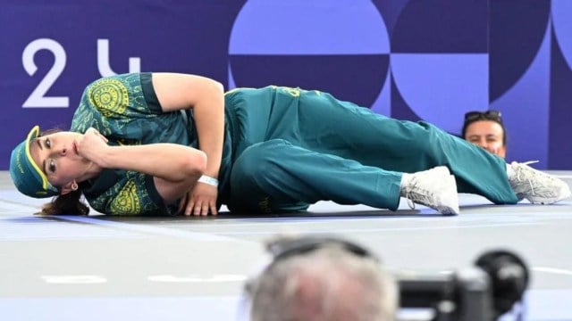 Raygun lying on the floor at the 2024 Olympics