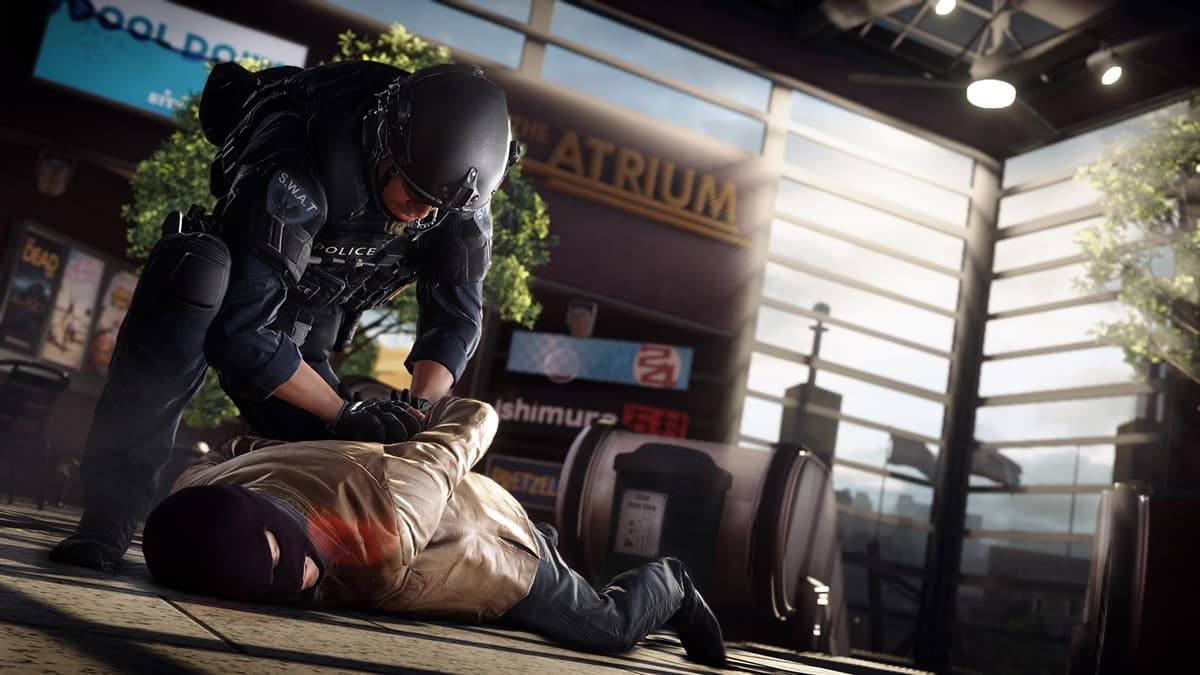 Policeman arresting and handcuffing a criminal pinned to the ground in Battlefield Hardline