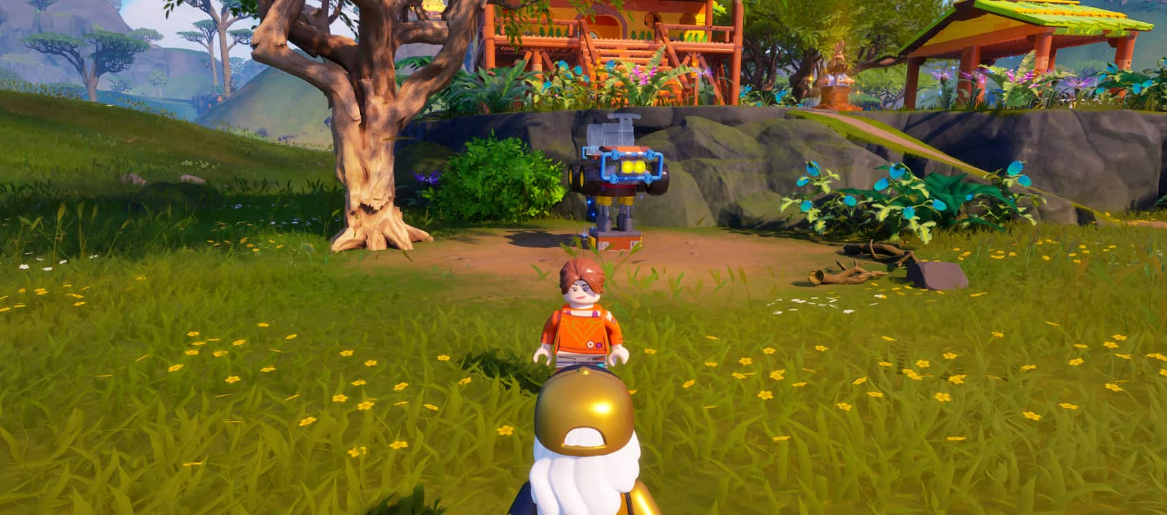 Haven stands in front of her small homestead in LEGO Fortnite