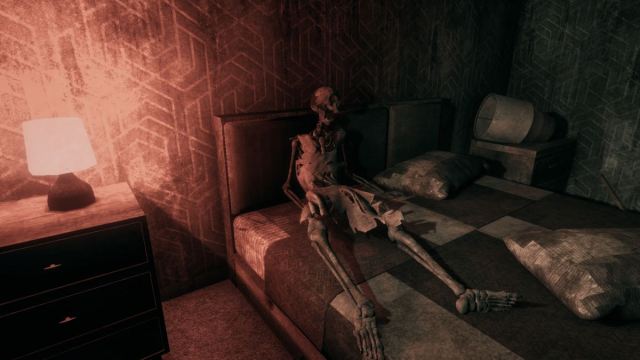 A skeleton sitting upright on an apartment bed