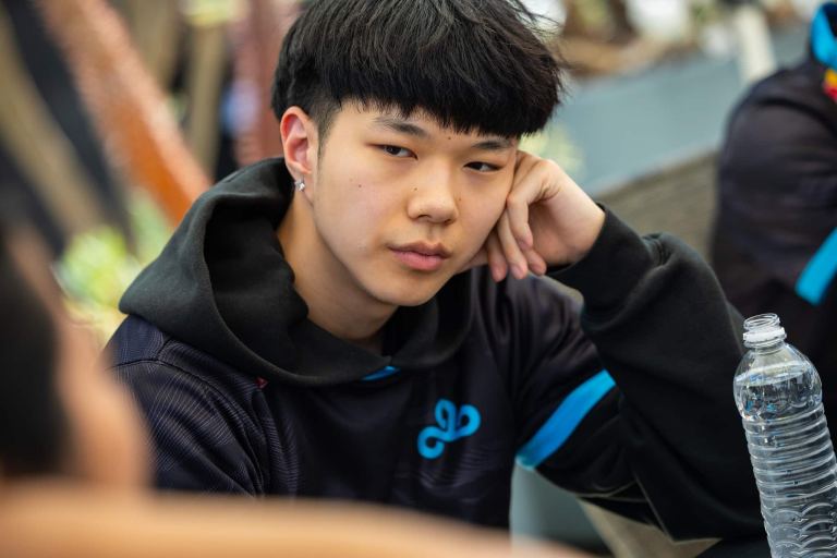 Jojopyun sits outside with his teammates after a match at the Riot Games Studios in LA.