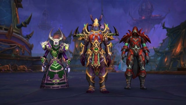 Three WoW characters standing next to each other in a dark, gloomy area, wearing spiky armor