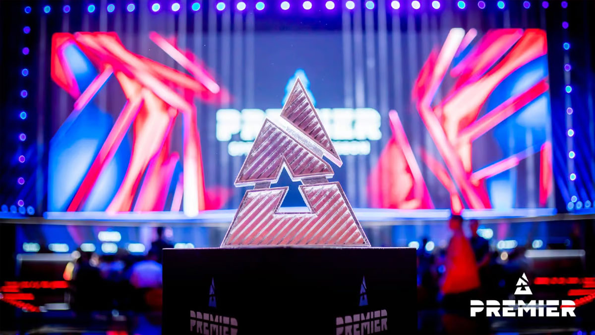 The BLAST trophy sits on a plinth in front of a stage.