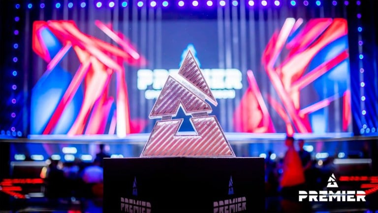 The BLAST trophy sits on a plinth in front of a stage.