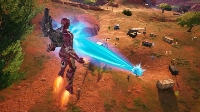 Iron Man eliminating an enemy at a dig site in Fortnite.