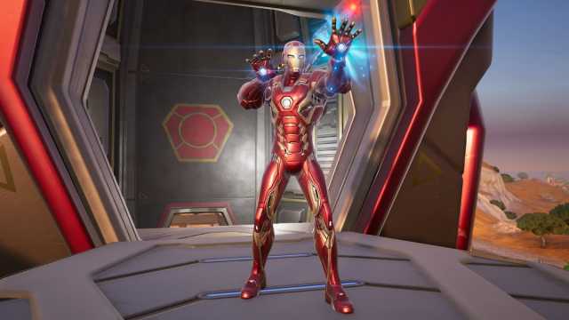 Iron Man standing at a Stark Mobile Armory in Fortnite.