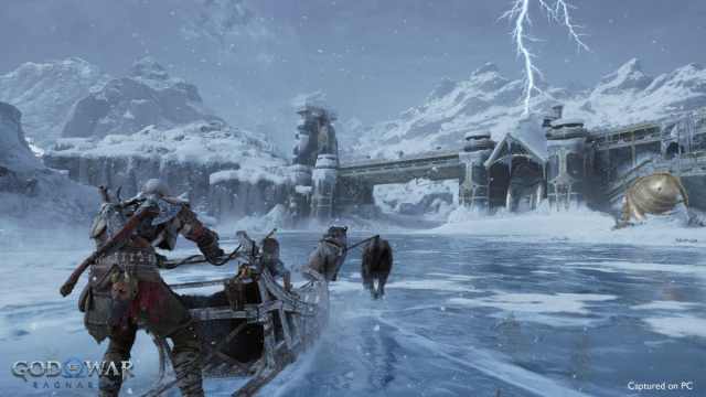 Kratos and Atreus on a sled on teh Lake of Nine.