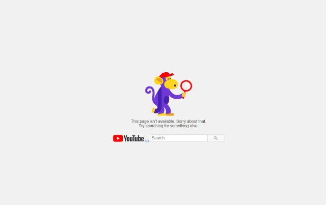 A screenshot of YouTube's 404 page featuring a monkey holding a magnifying glass.