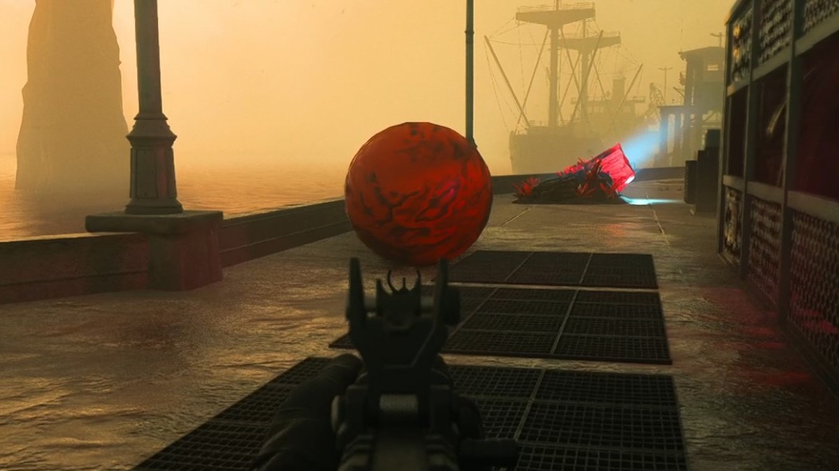 Warzone player aiming down sights with a rifle toward a Terriball on the Purgatory Island