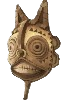 A yellow tribal mask with teeth and spiral eyes. This shows readers what the Curious Mask looks like