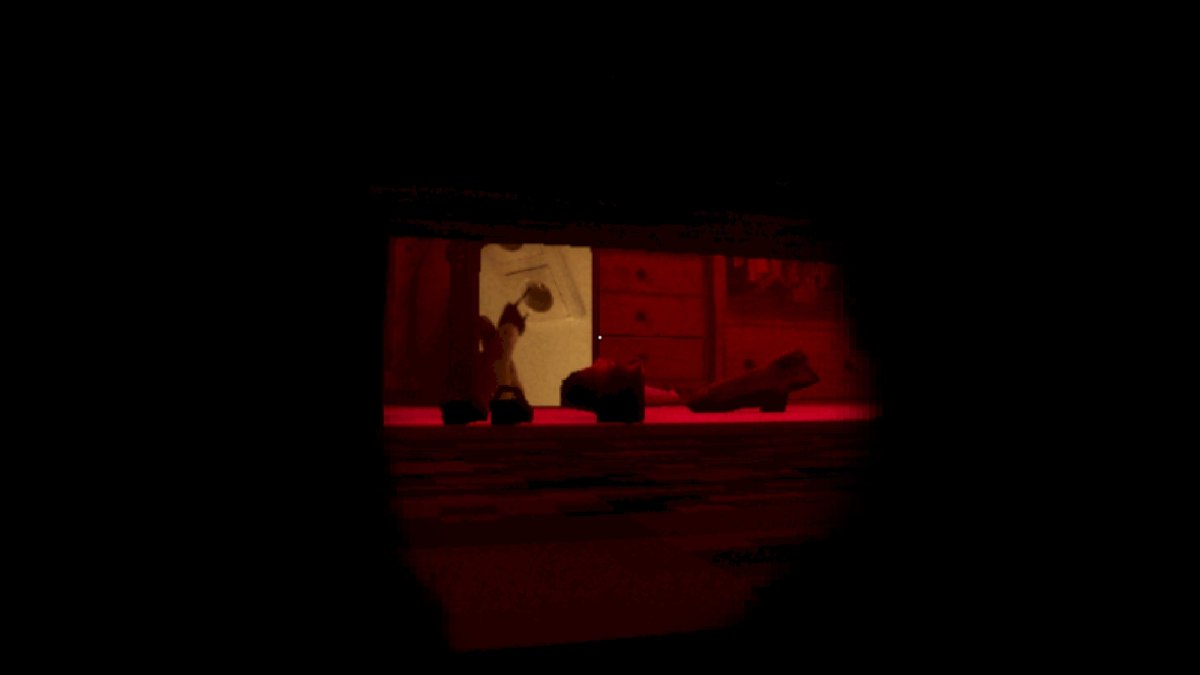 An under the bed shot of a child legs hanging off the side of the bed