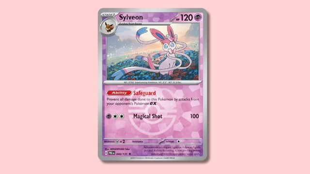 Sylveon Pokémon card on a pink background.