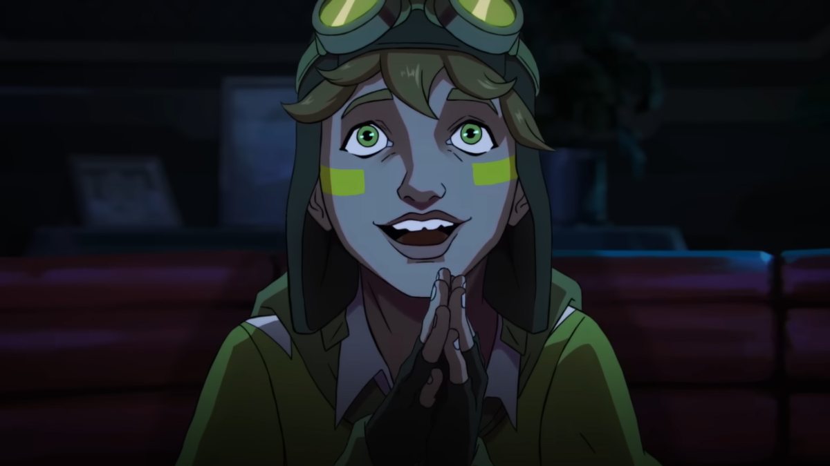 A hopeful fan with wide eyes and a big smile, rubbing their hands while watching