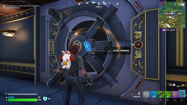 An image from Fortnite of the player placing Thermite on a vault door to break it open.