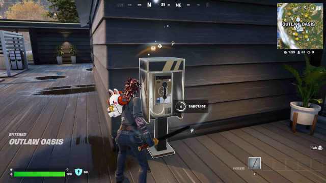 An image from Fortnite of the player interacting and sabotaging a payphone.