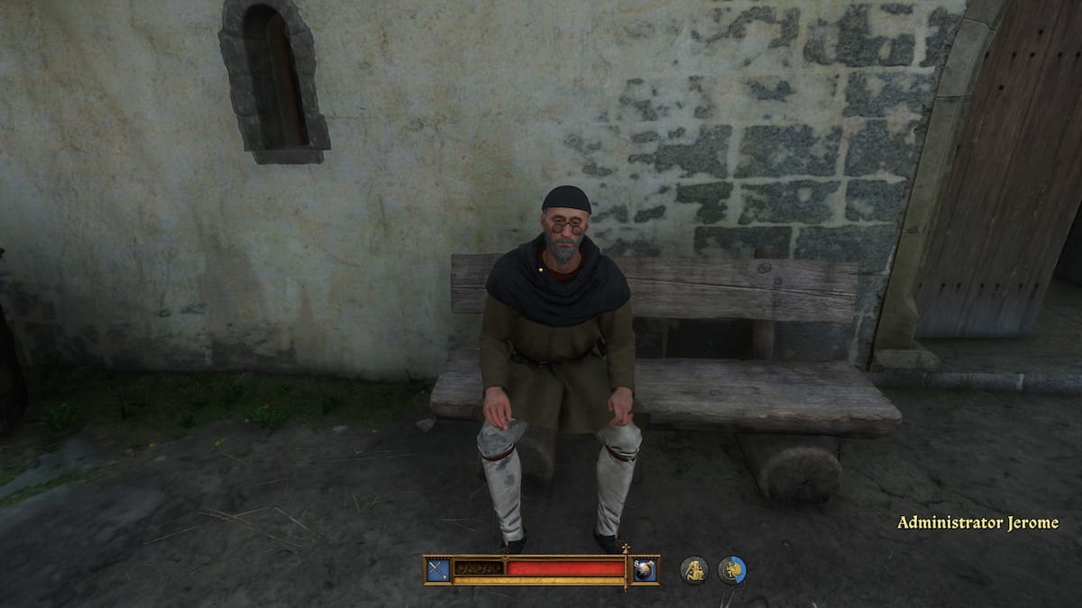 Older man with glasses sitting on a bench against a house