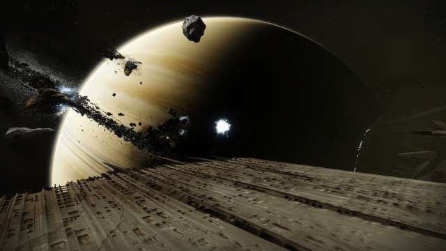 A floating ball of light stands at the edge of the Dreadnaught, with Saturn visible in the background.