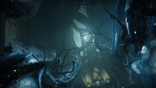 A dark area with sprawling tentacles and a door with Hive symbols below.