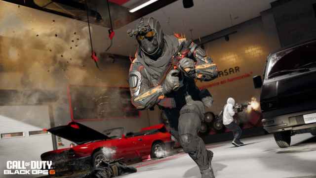 CoD operator running ina  car dealership with a submachine gun in BO6 multiplayer