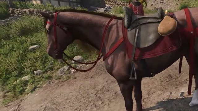 Herring brown horse with red saddle in Kingdom Come: Deliverance 2.