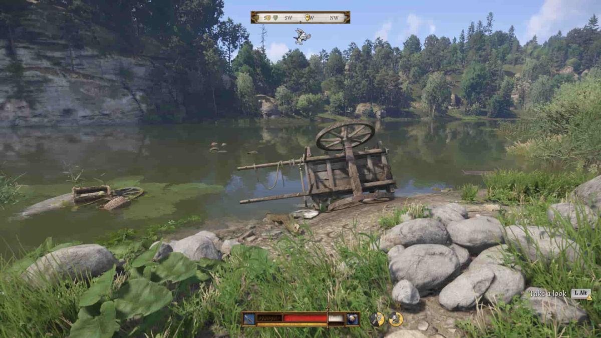 Merchant's tipped cart in water in Kingdom Come Deliverance 2.