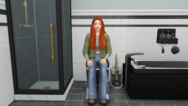 A sim with orange hair and a green flannel sitting and pondering time travel on a toilet in the sims 4.